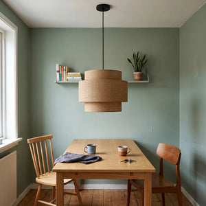 Narya Fabric Chandelier above a table in a sage green dining nook - Magalis Egypt