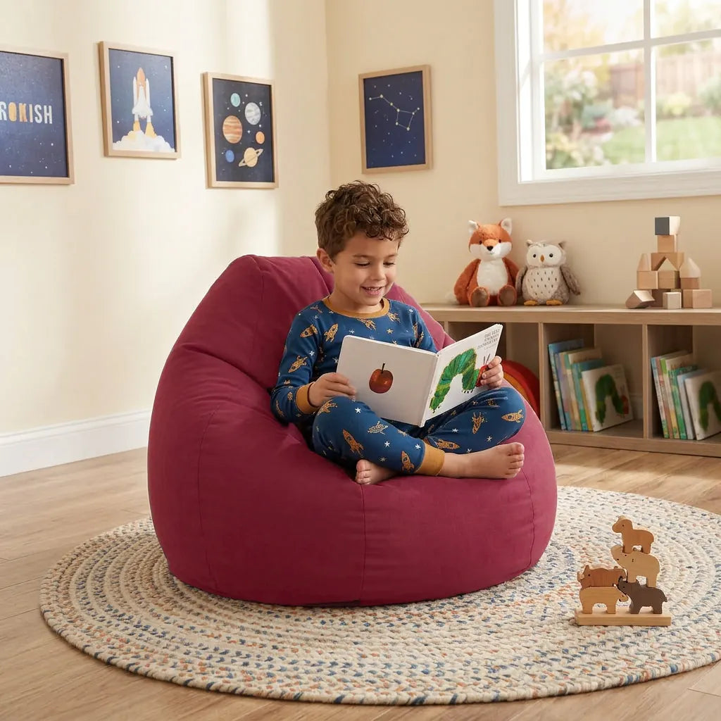 Medium kids bean bag in Maroon: boy reading a picture book - Magalis Egypt