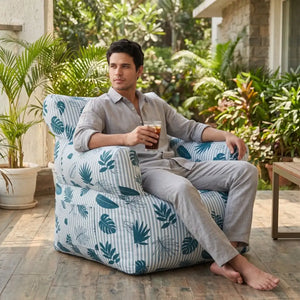 Royal Chair Leaves on a garden terrace with a man relaxing - Magalis Egypt