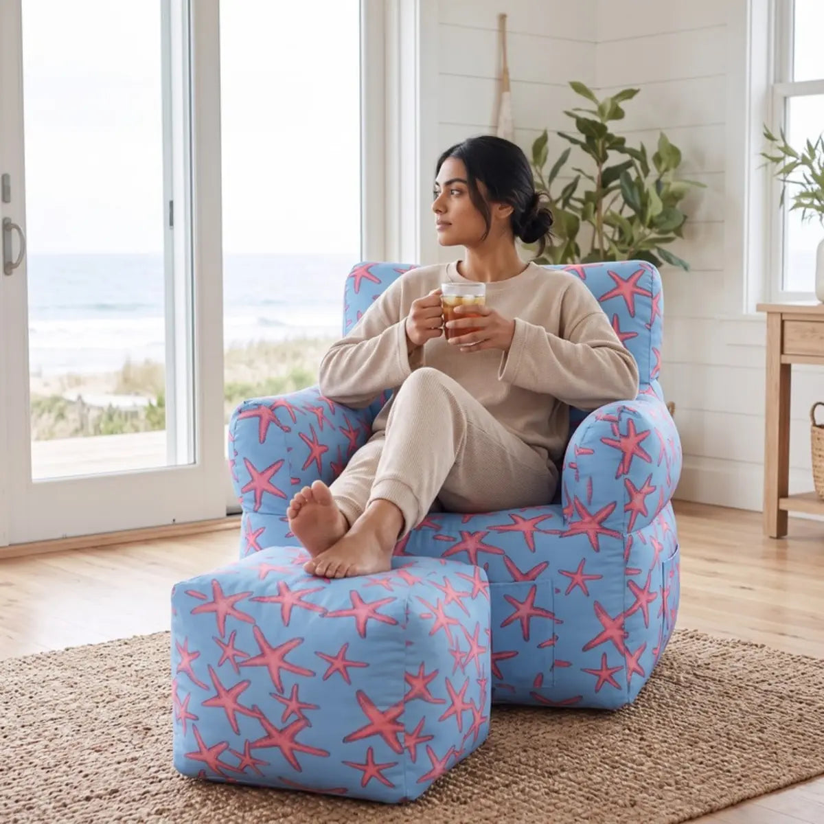 Royal Chair Starfish: woman with iced tea by the sea - Magalis Egypt