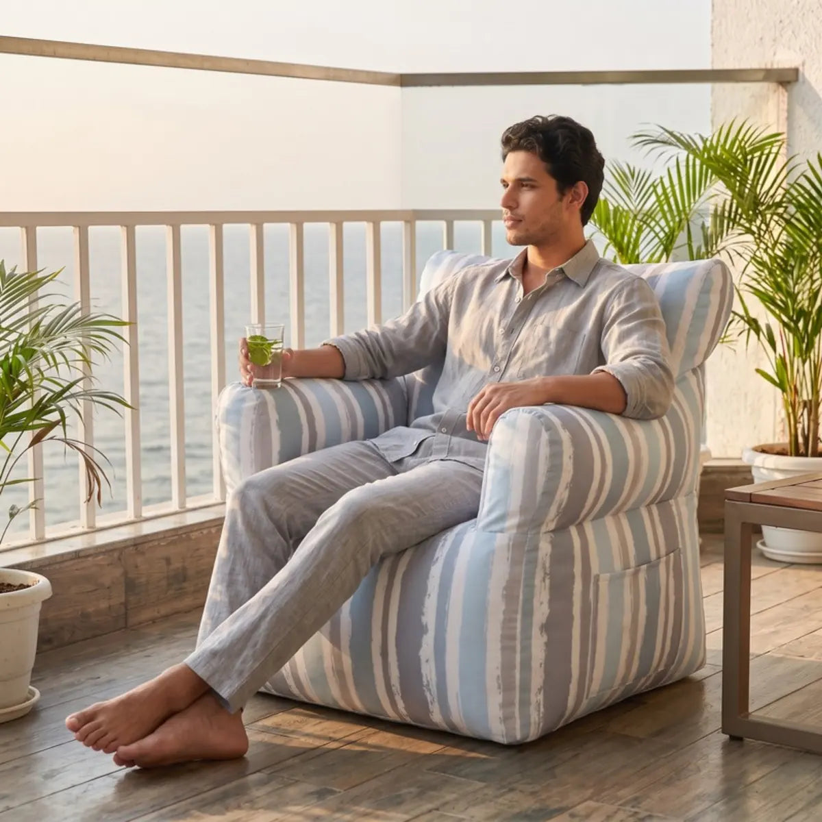 Royal Chair Waves on a seaside balcony with a man relaxing - Magalis Egypt